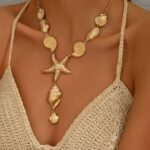 Collier étoile de mer et coquillages.